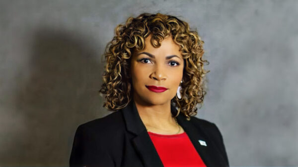 Headshot of April Sims, our 2025 Changemakers emcee